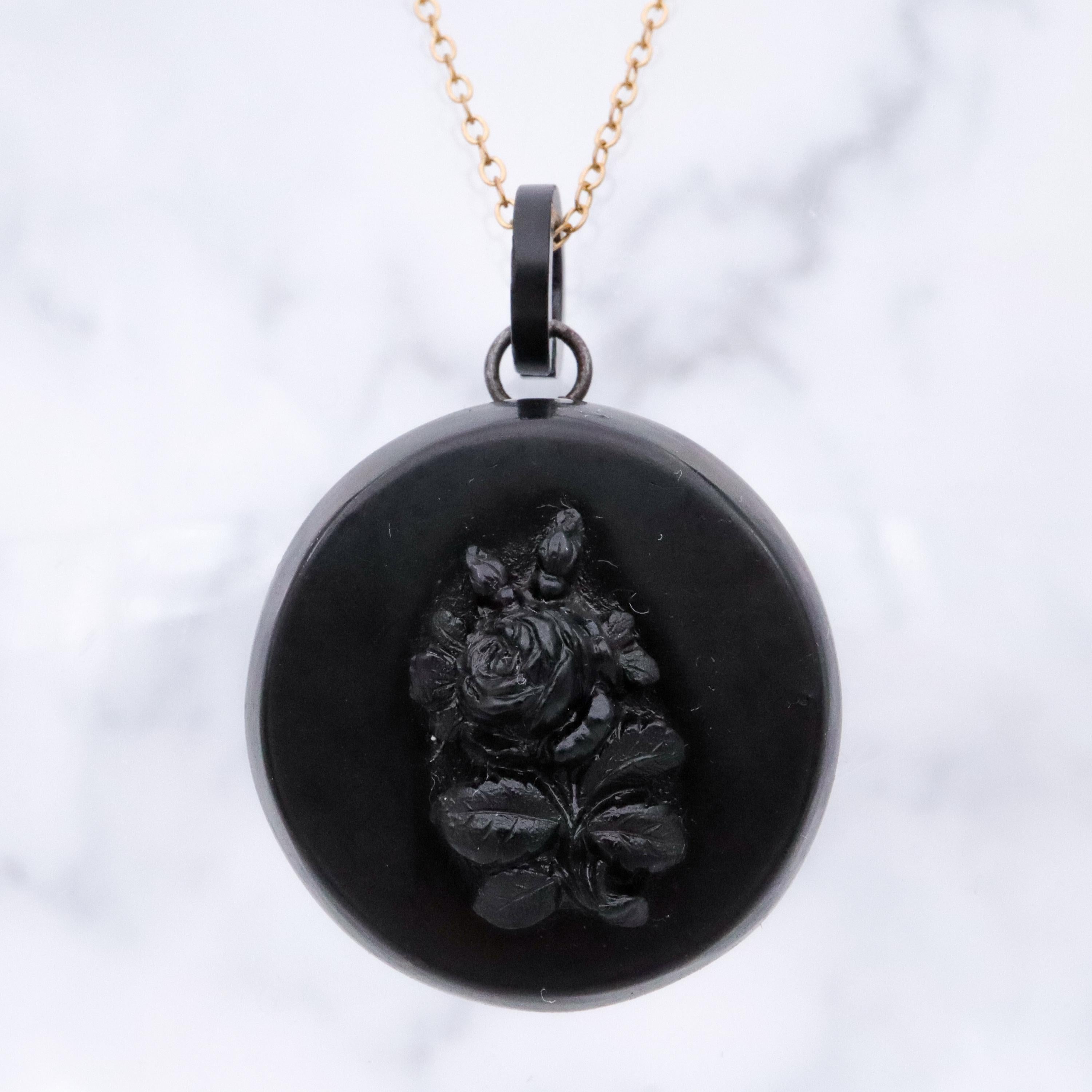 Victorian gutta percha flower round small locket