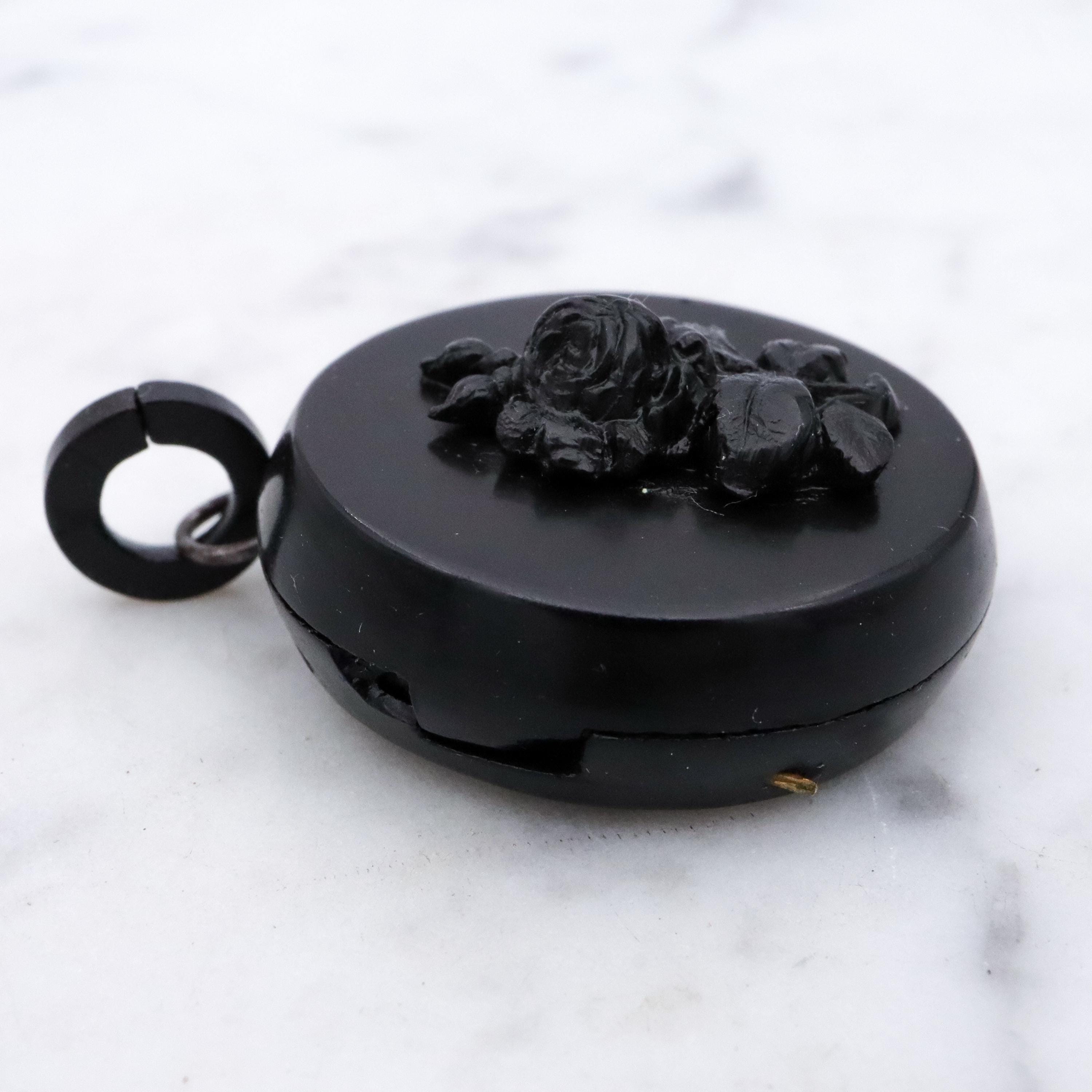 Victorian gutta percha flower round small locket