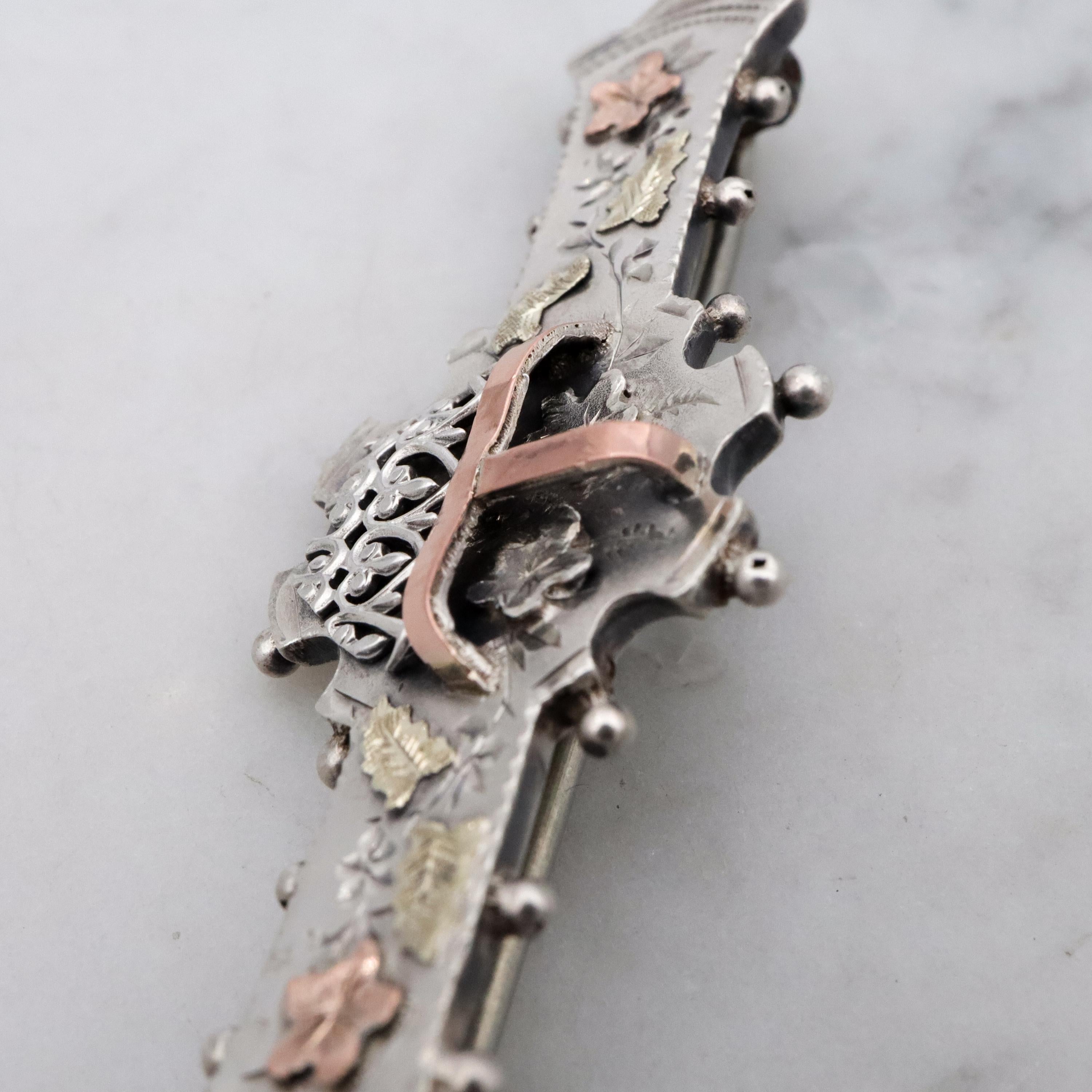 Victorian tri-color sterling Aesthetic Movement bar brooch with dimensional flower basket