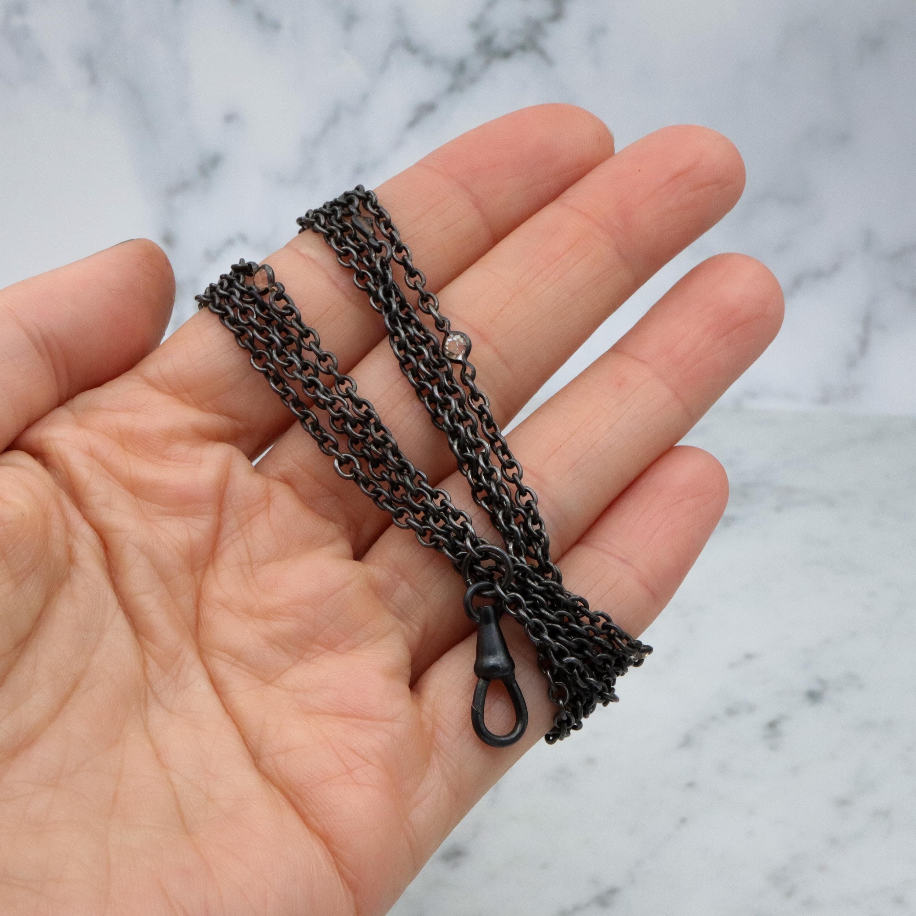 Victorian gunmetal 54" long muff guard chain w/open back crystal accents & dog clip clasp