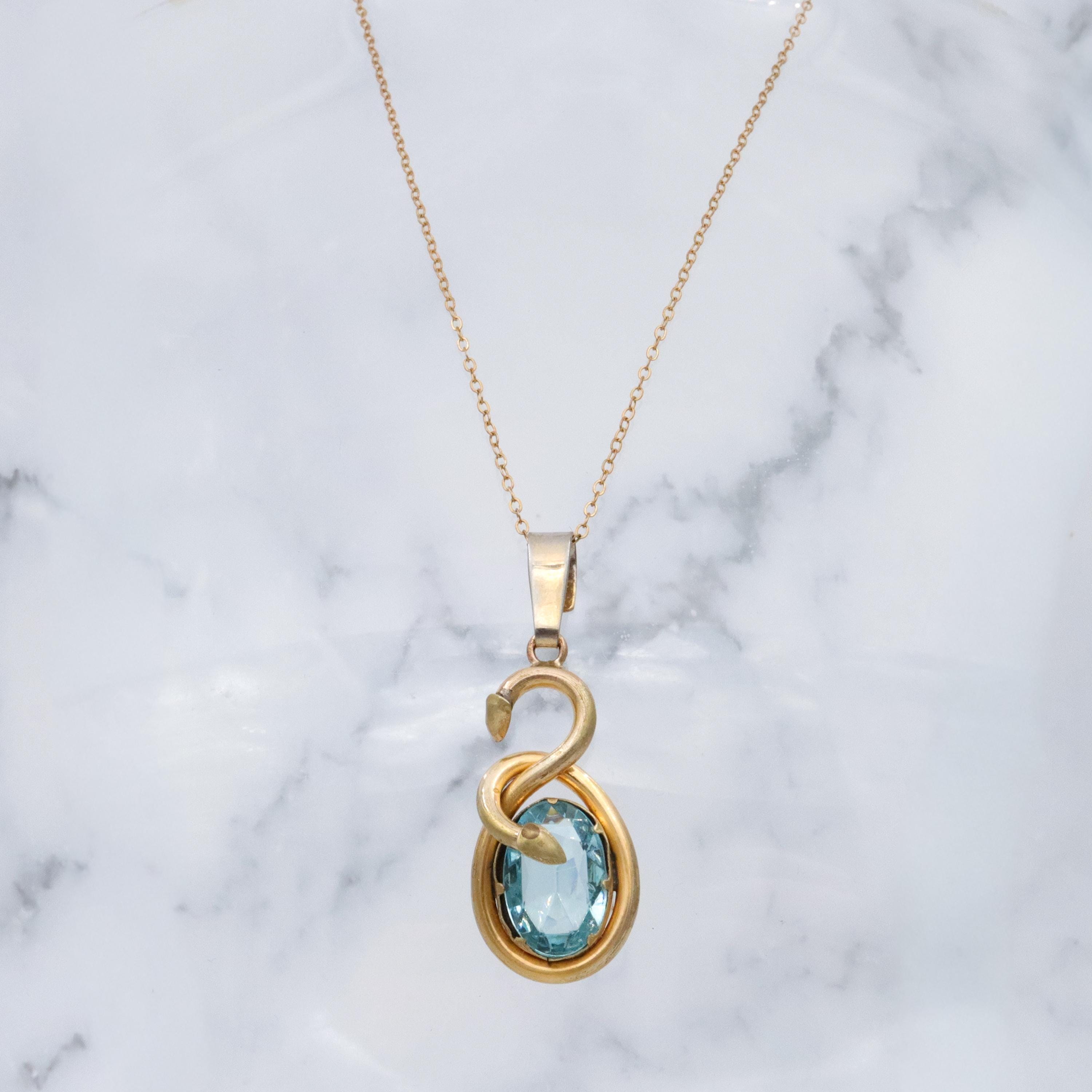 Victorian gilt metal & aqua glass snake pendant