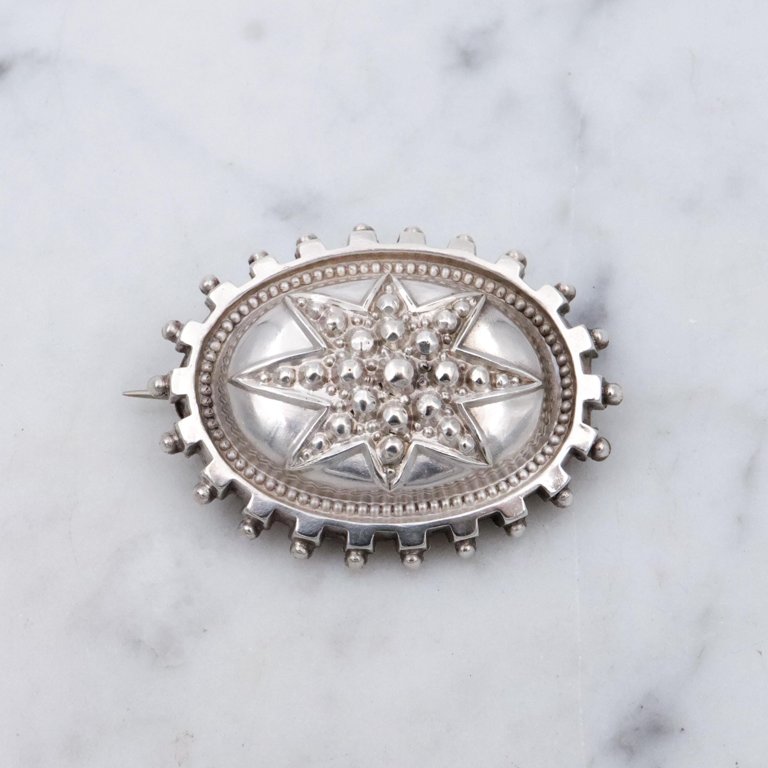 Aesthetic Movement Victorian sterling star & bead oval brooch