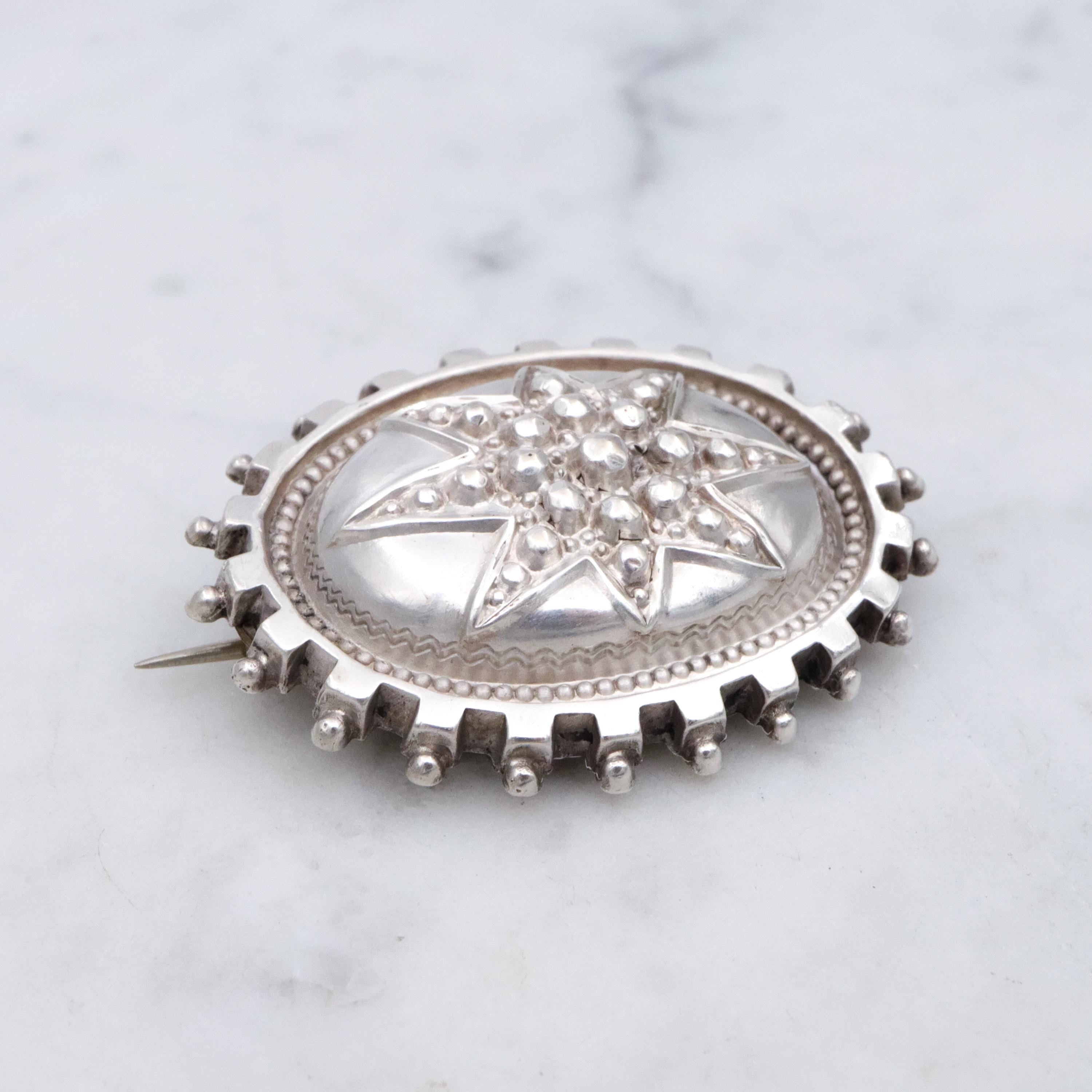 Aesthetic Movement Victorian sterling star & bead oval brooch