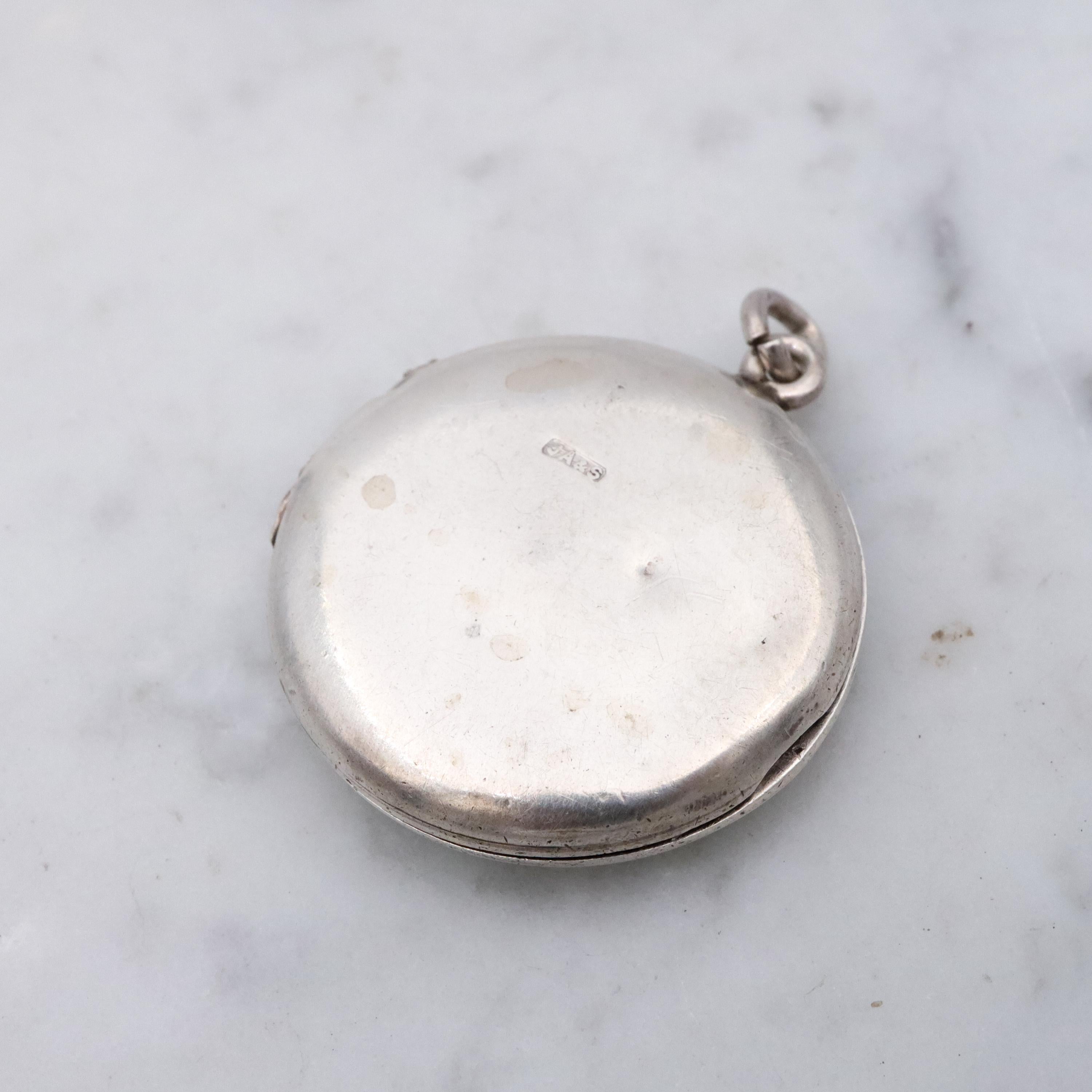 Edwardian sterling white enamel rosebud round locket pendant by John Atkins & Son