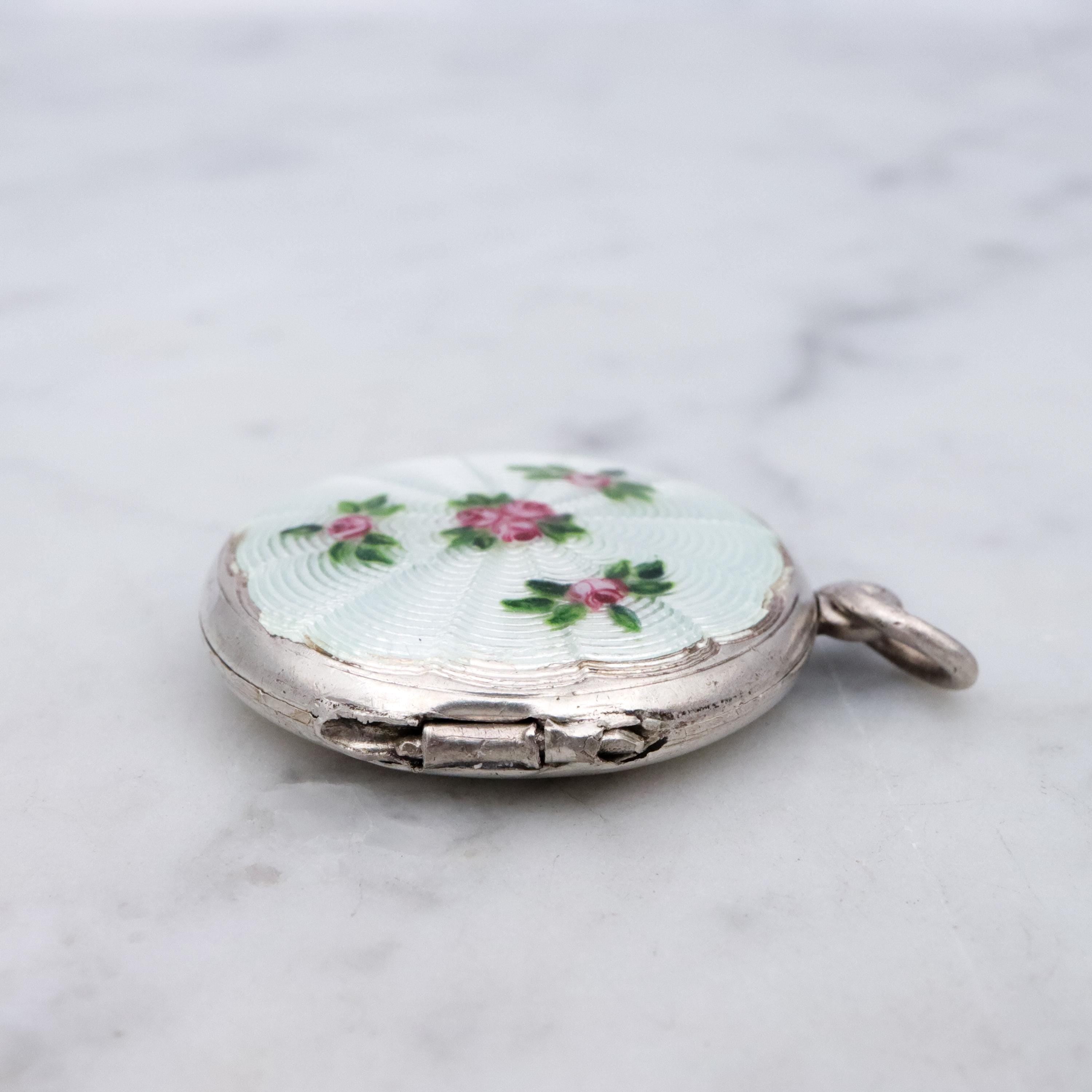 Edwardian sterling white enamel rosebud round locket pendant by John Atkins & Son