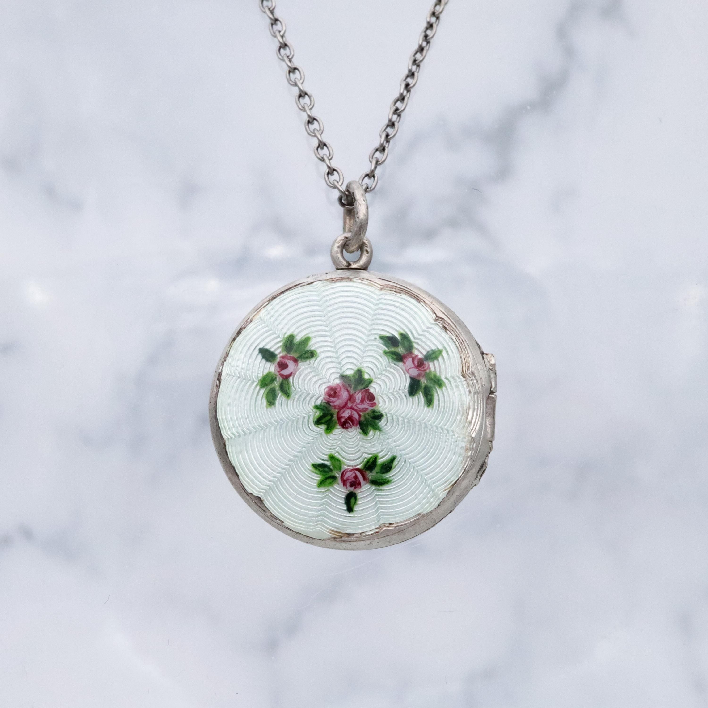 Edwardian sterling white enamel rosebud round locket pendant by John Atkins & Son