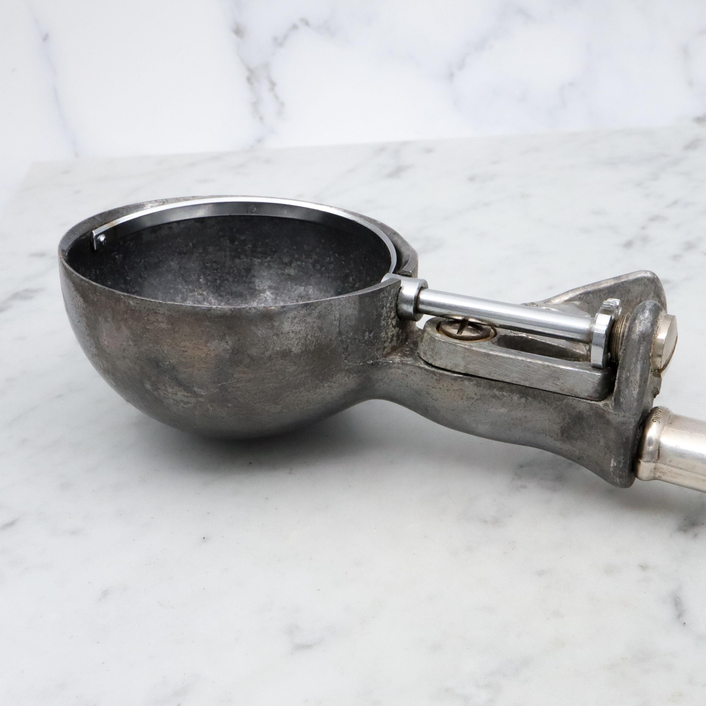 Retro Peerless aluminum spring loaded ice cream scoop with sterling handle