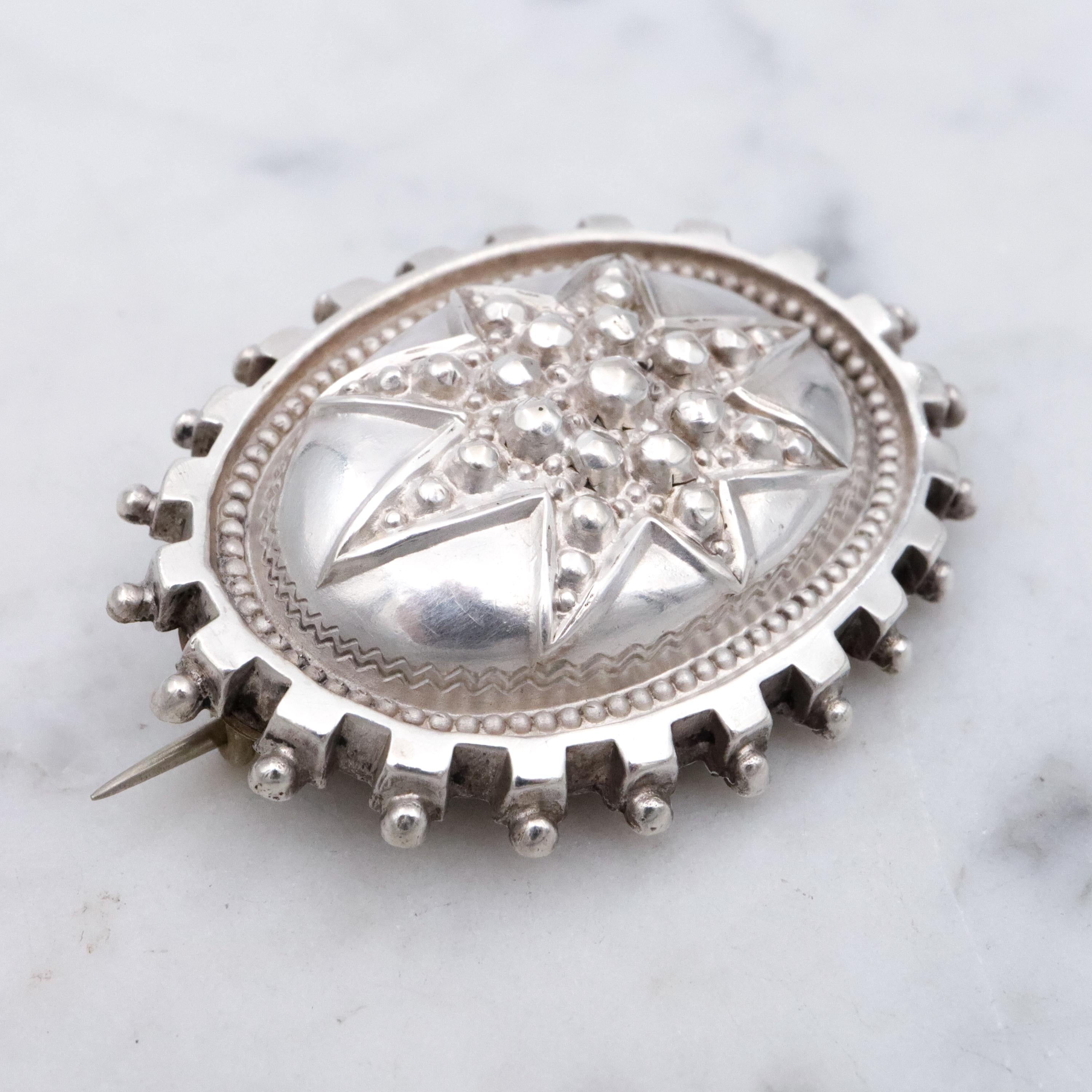 Aesthetic Movement Victorian sterling star & bead oval brooch