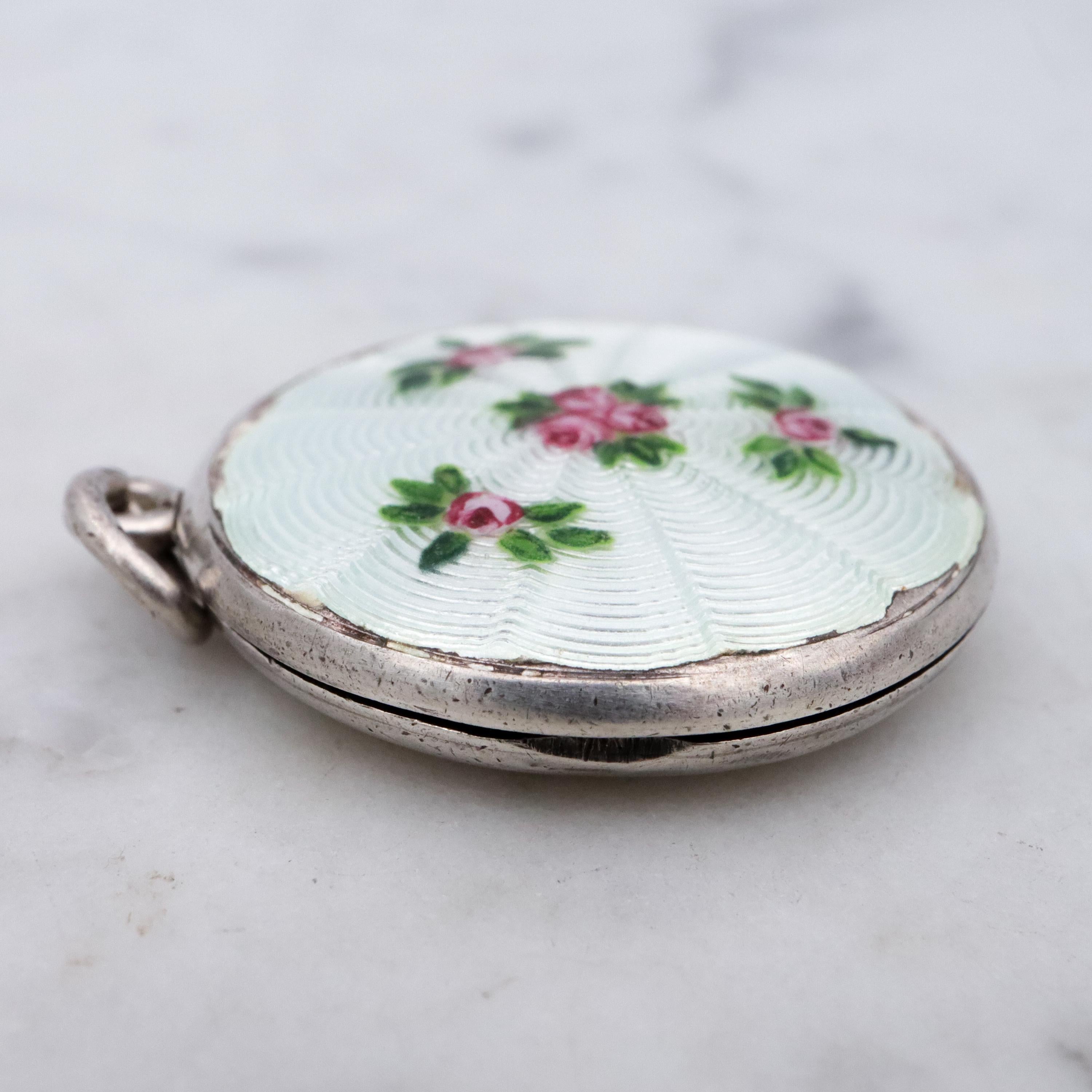 Edwardian sterling white enamel rosebud round locket pendant by John Atkins & Son