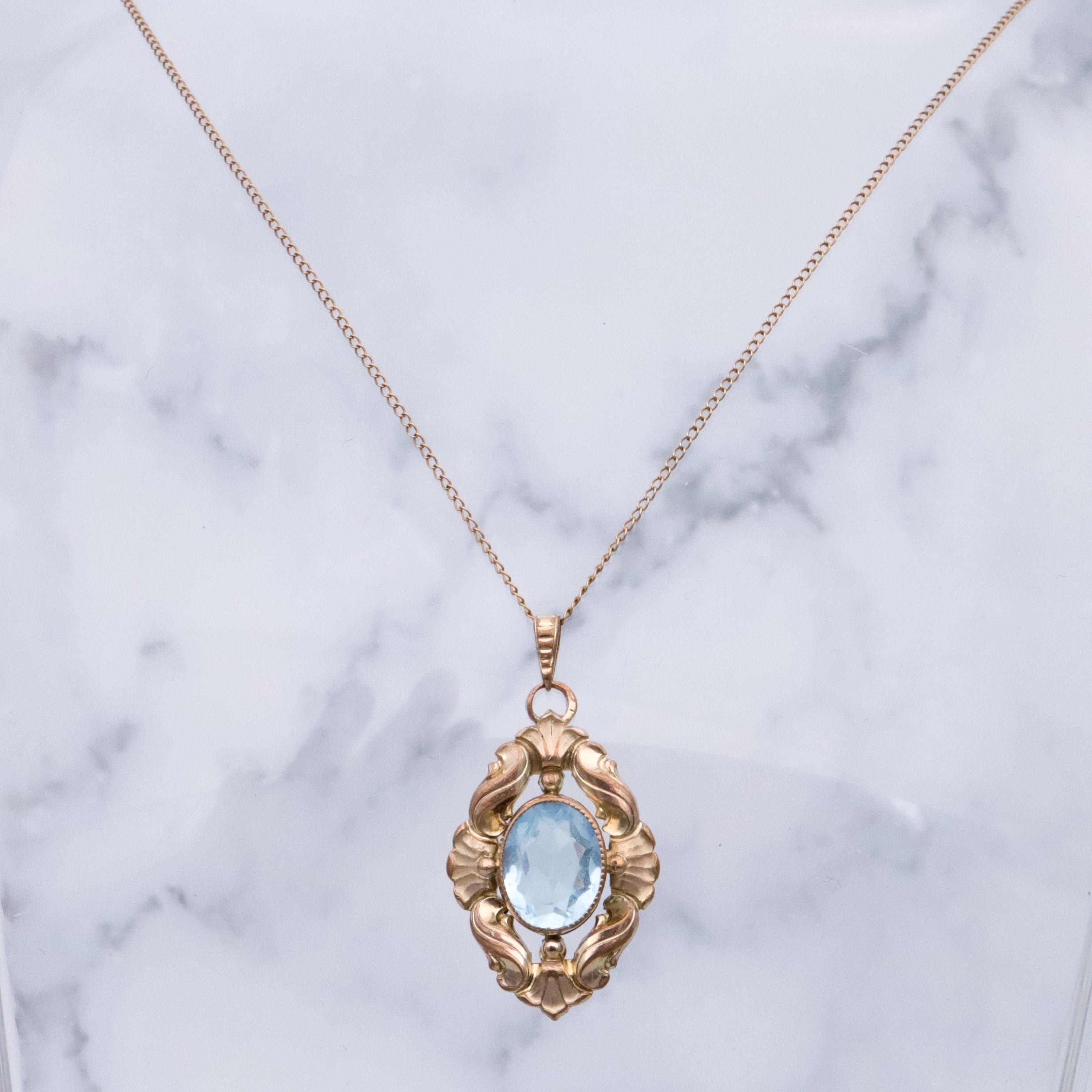 1930s Kollmar & Jourdan rolled gold aqua glass Rococo pendant