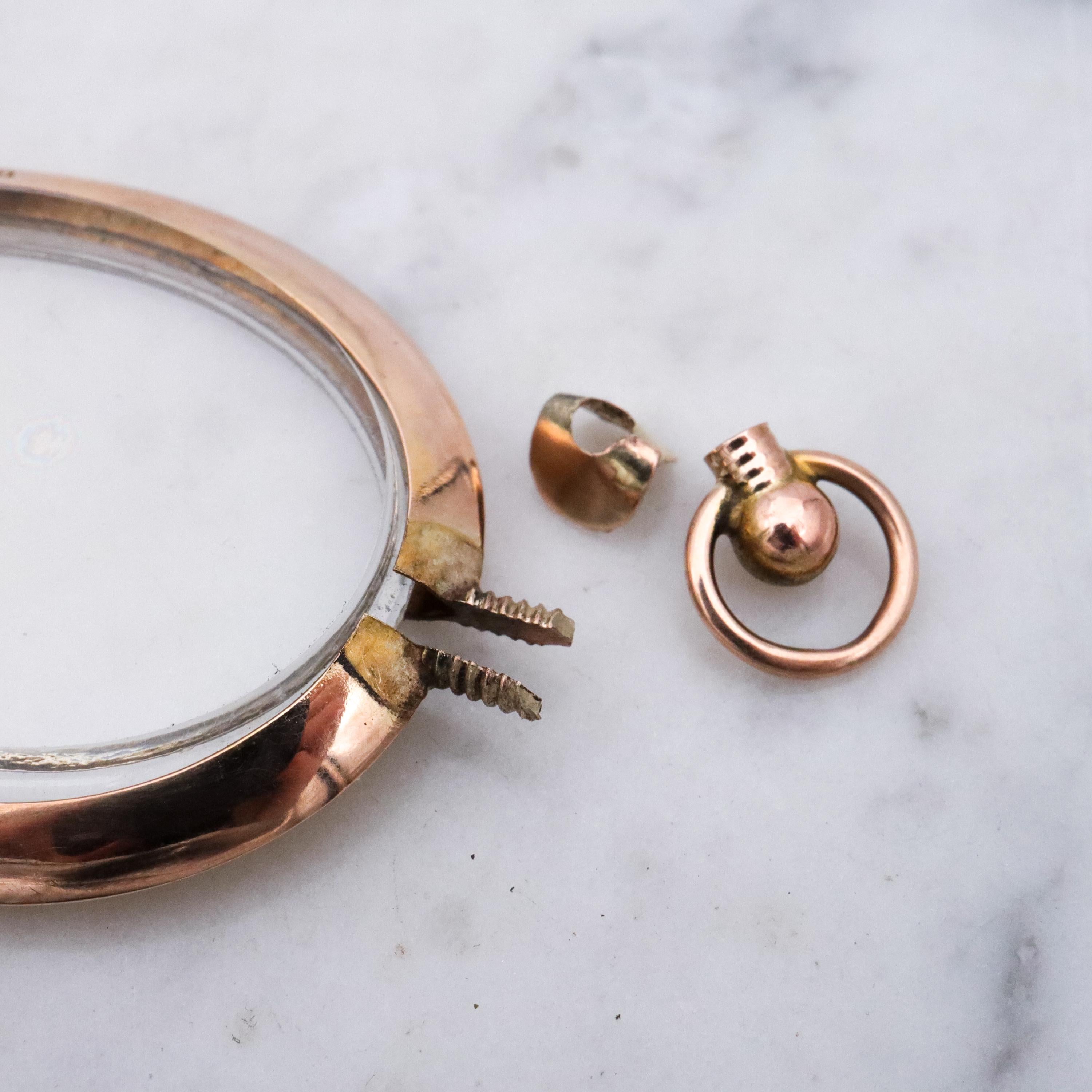 Edwardian 9K rose gold open-face glass locket pendant