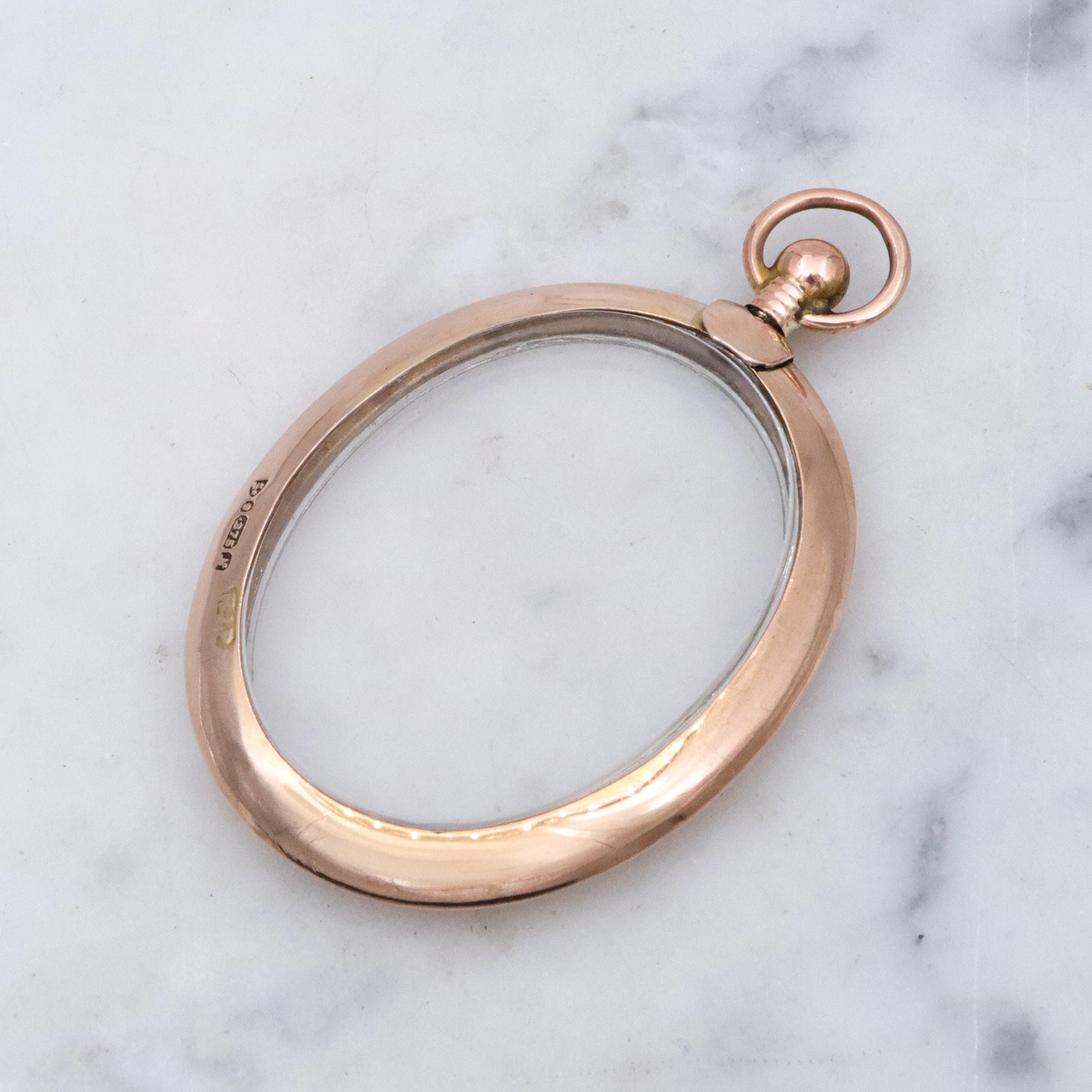 Edwardian 9K rose gold open-face glass locket pendant