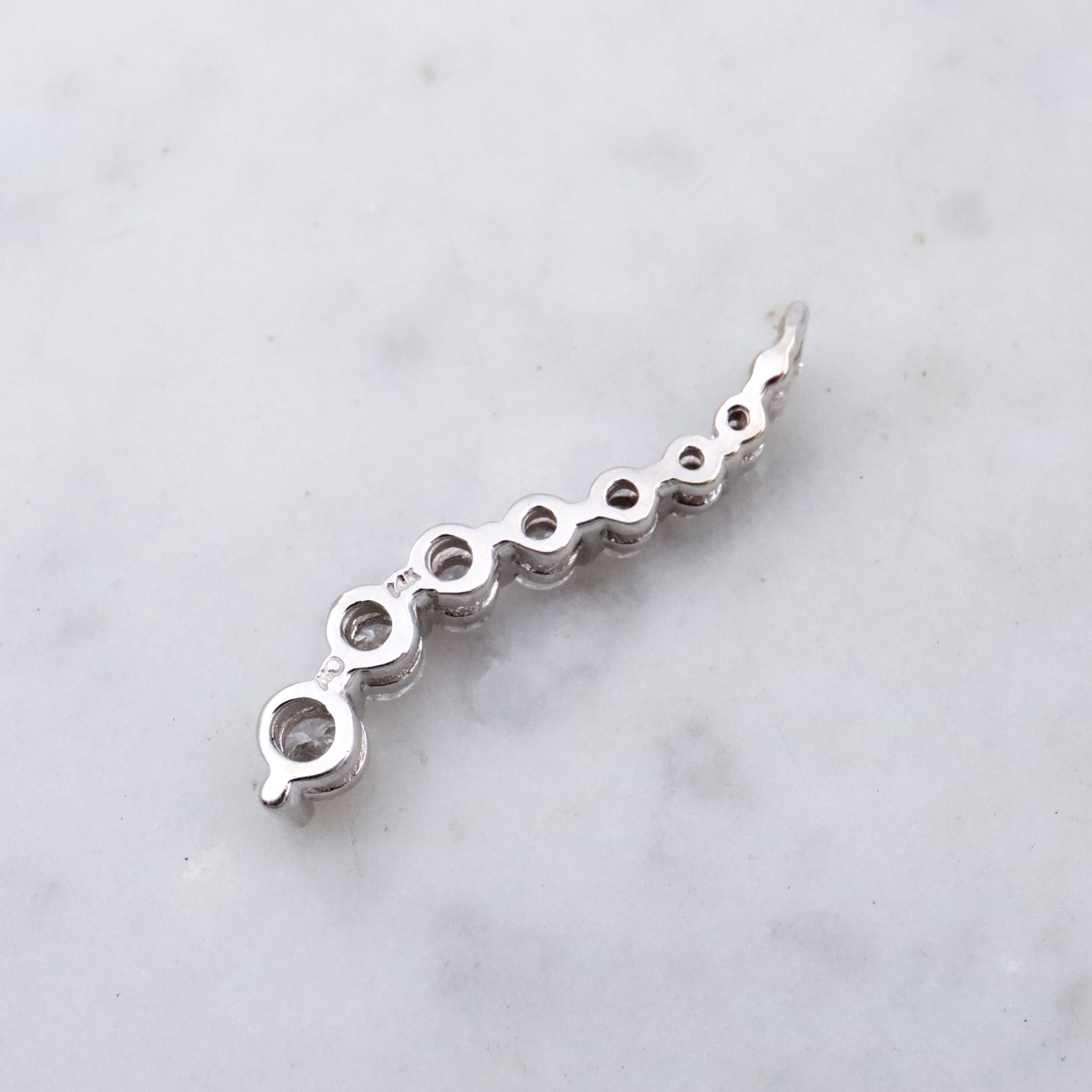 Vintage 14k white gold S-curve diamond journey pendant