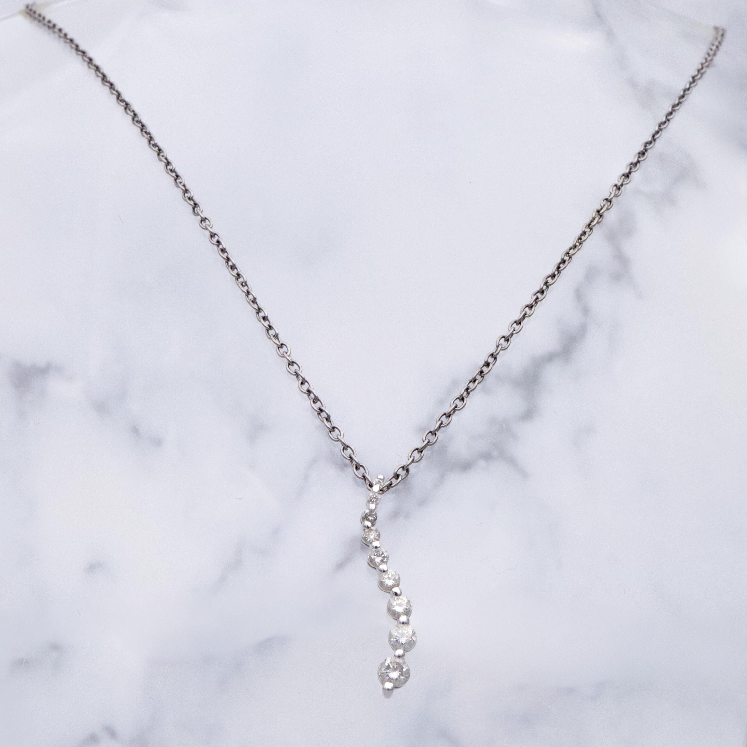 Vintage 14k white gold S-curve diamond journey pendant