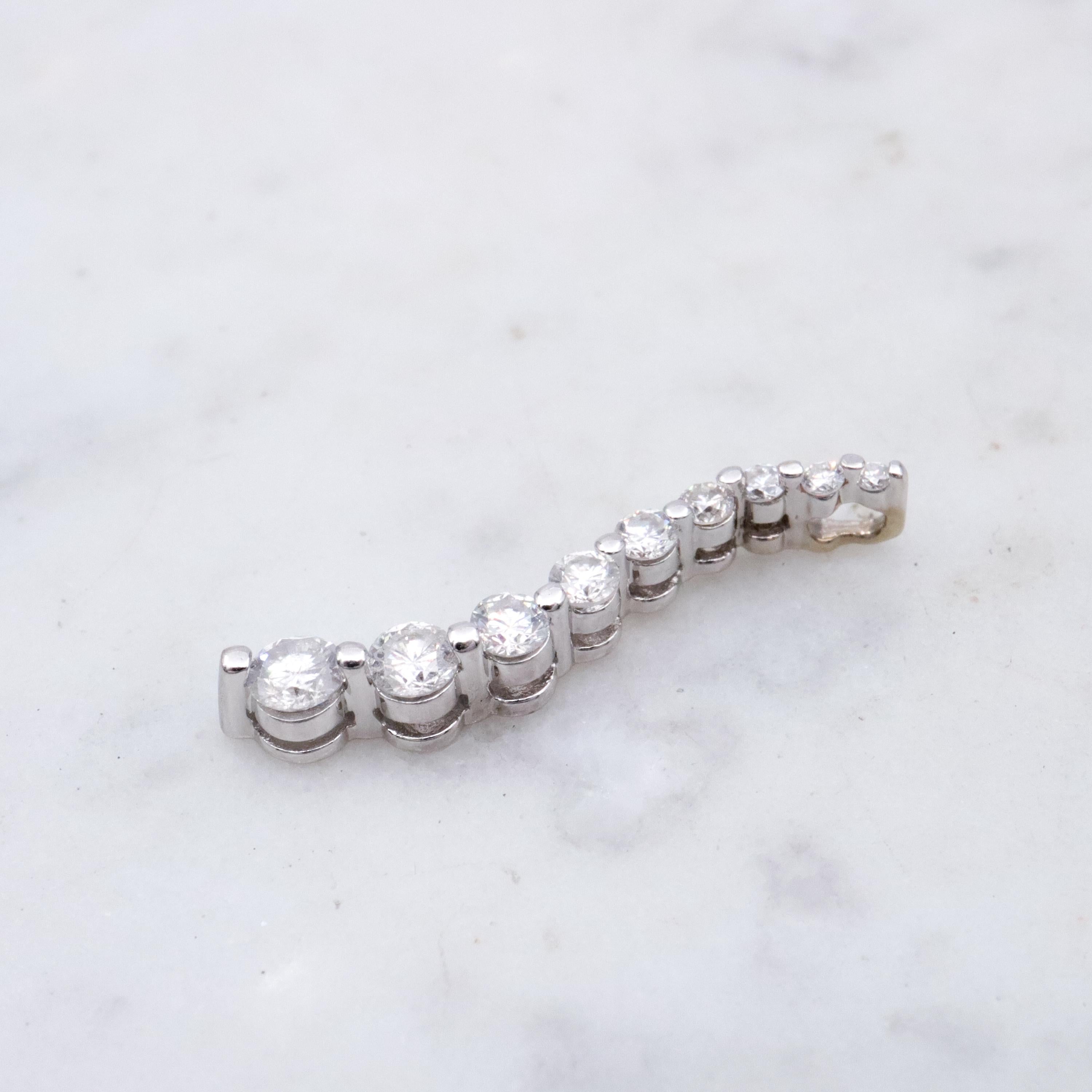 Vintage 14k white gold S-curve diamond journey pendant