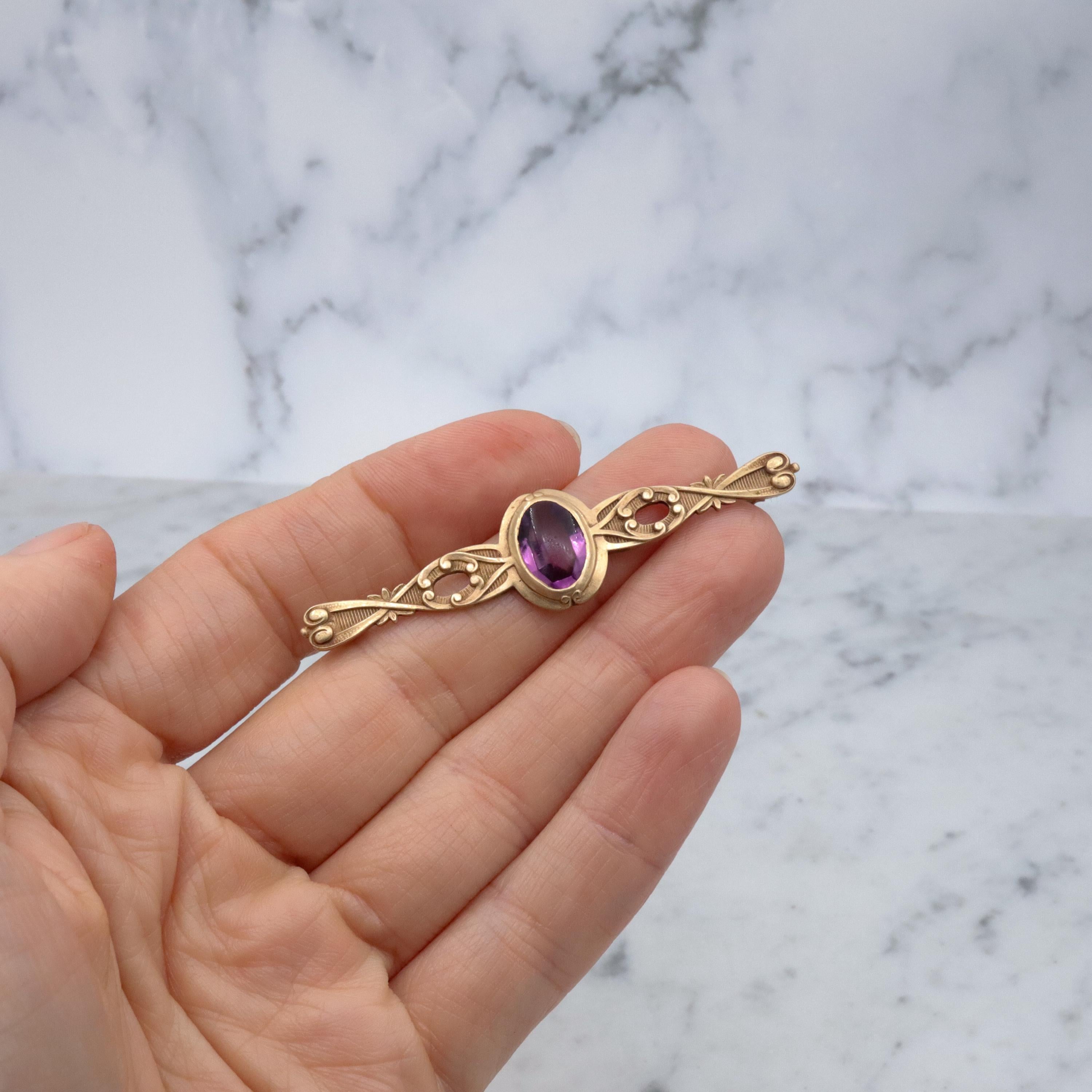 Antique Art Nouveau purple paste & scroll designed rolled gold bar pin