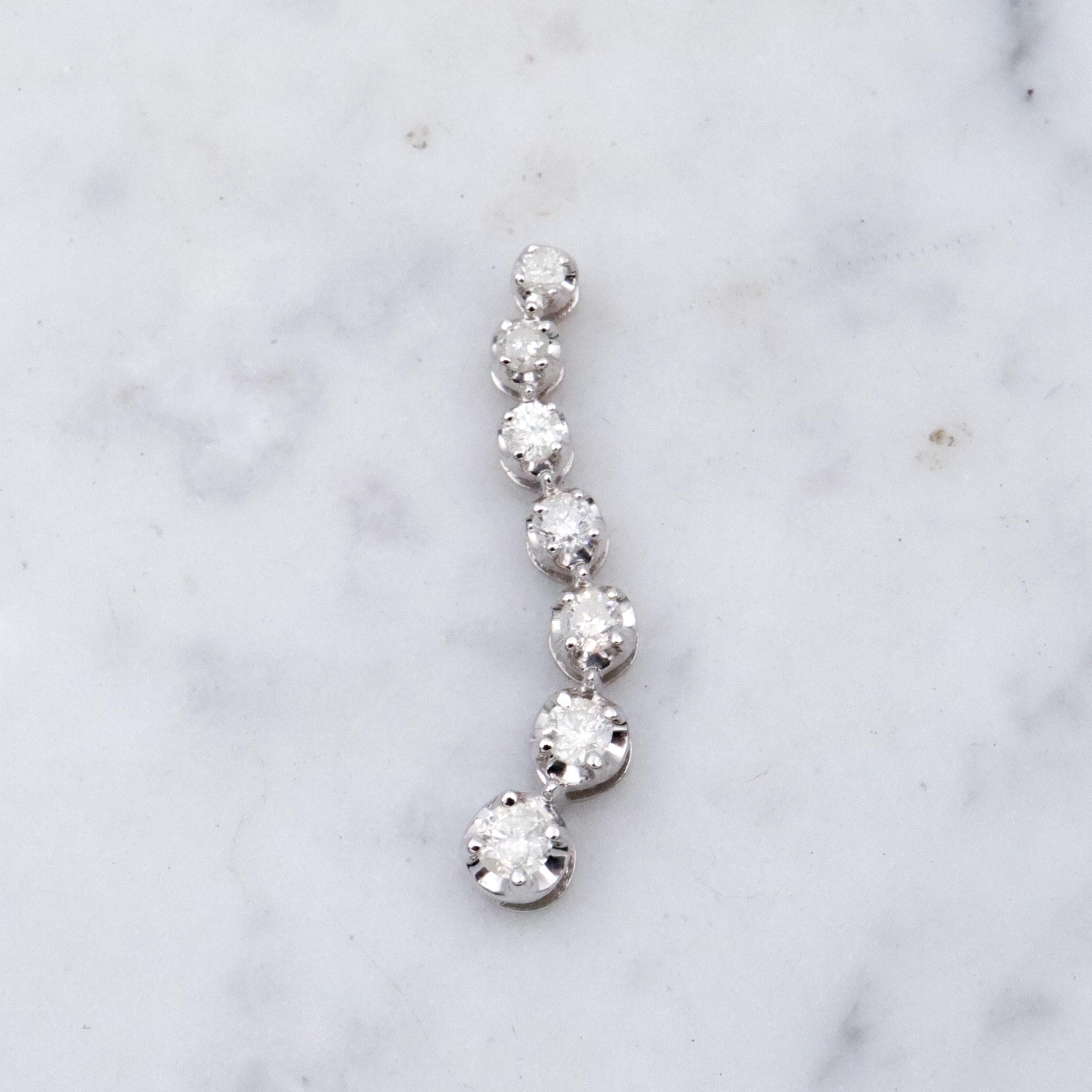 Vintage 10k white gold diamond graduated S-curve journey pendant