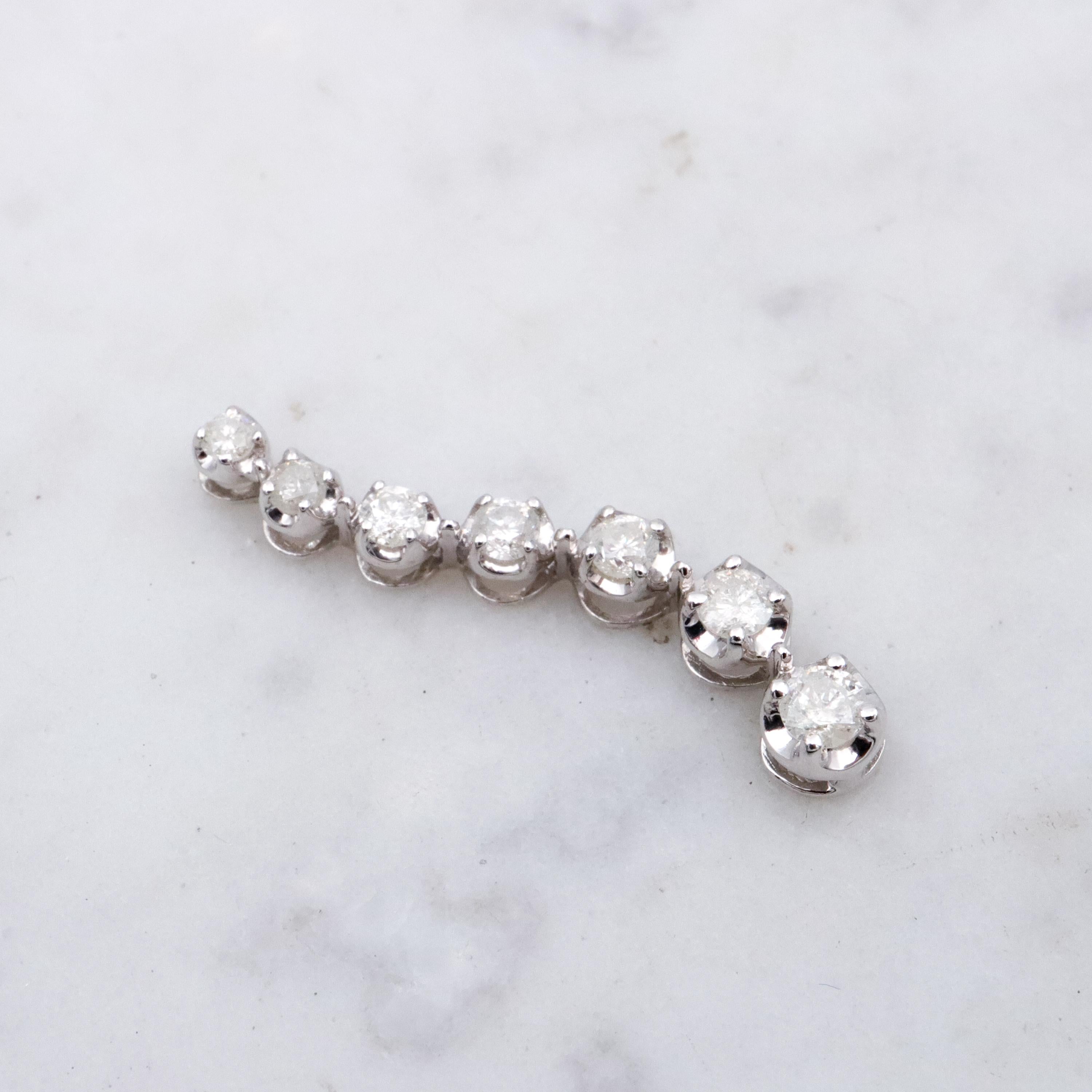 Vintage 10k white gold diamond graduated S-curve journey pendant