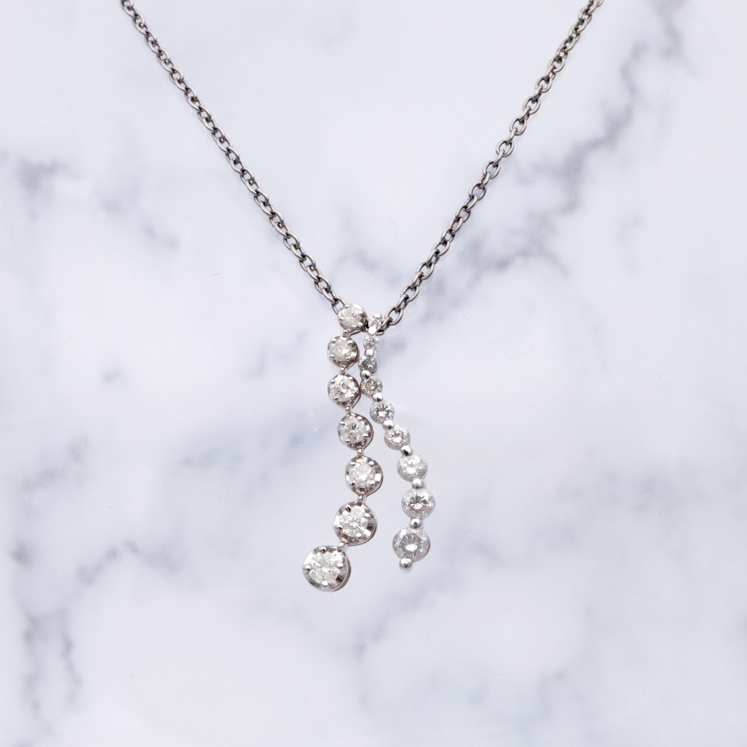 Vintage 10k white gold diamond graduated S-curve journey pendant