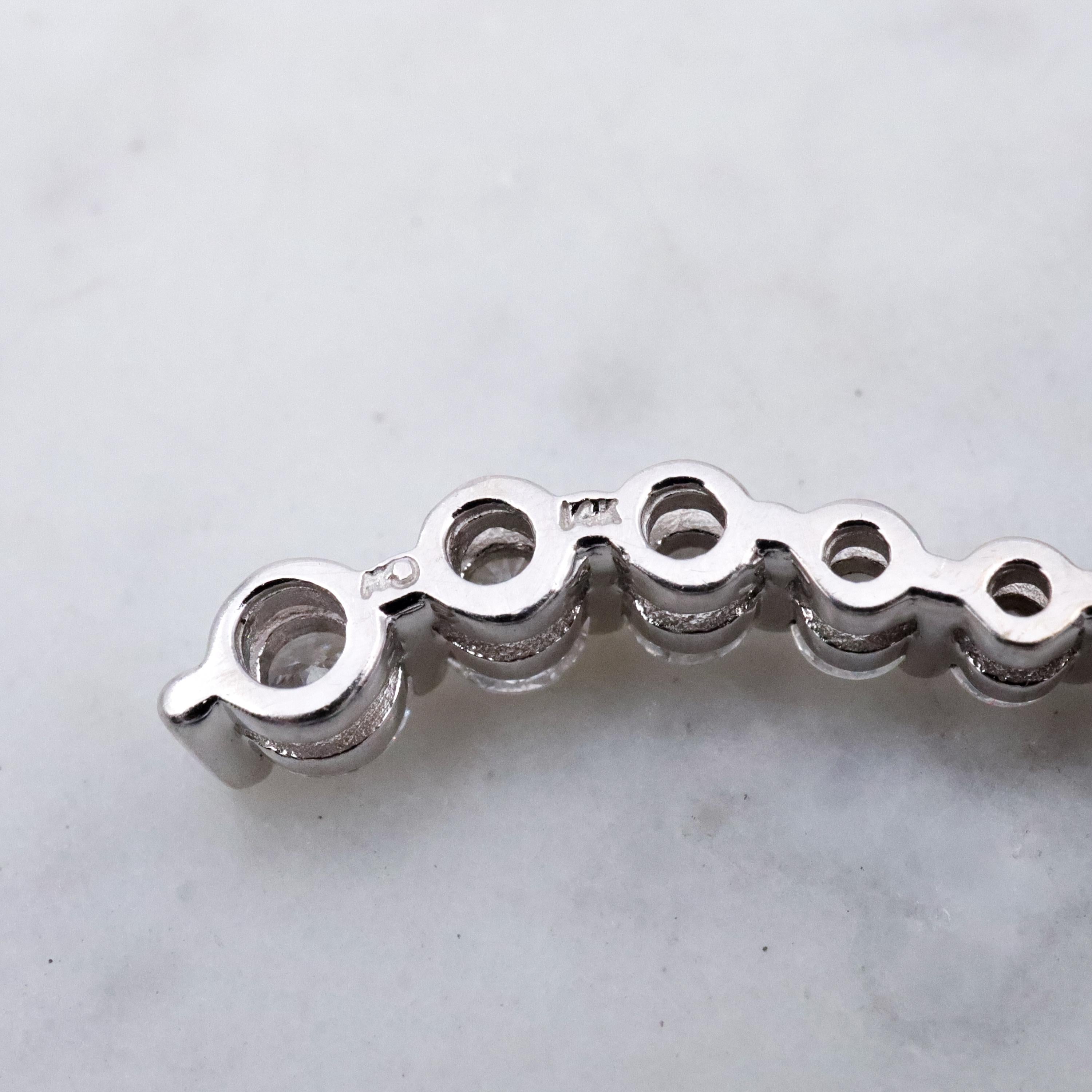 Vintage 14k white gold S-curve diamond journey pendant