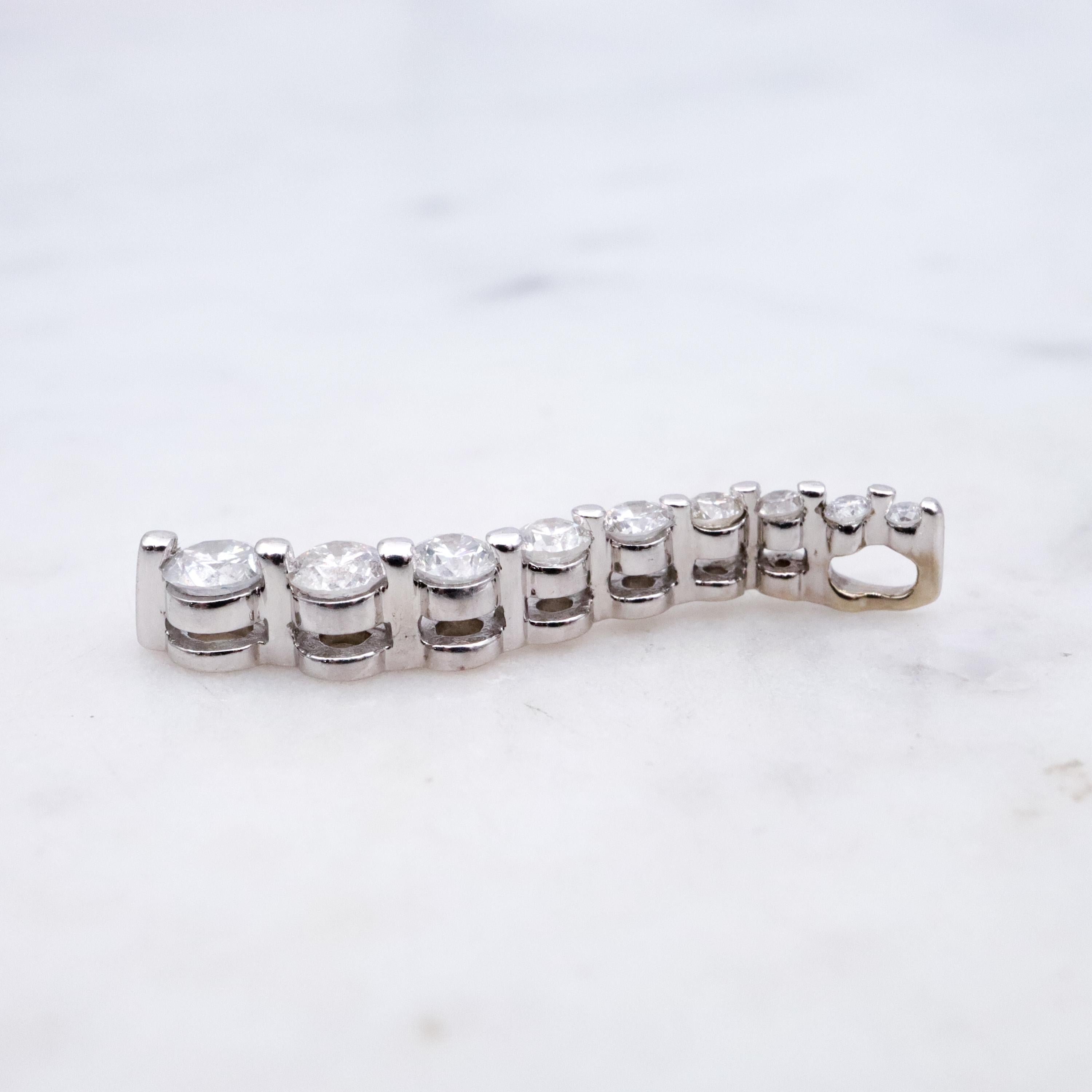 Vintage 14k white gold S-curve diamond journey pendant